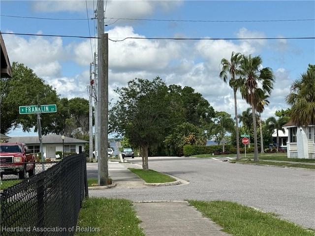 351 N Commerce Ave, Sebring, FL 33870 - view of asphalt road with sidewalks and traffic signs
