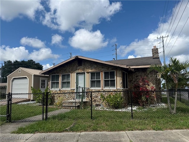 351 N Commerce Ave, Sebring, FL 33870 - ranch-style home featuring a chimney, concrete driveway, and a gate