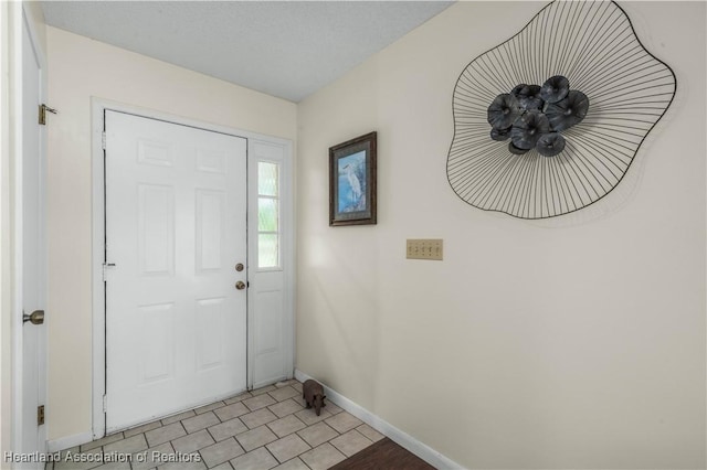 2407 Par Rd, Sebring, FL 33872 - foyer entrance featuring baseboards