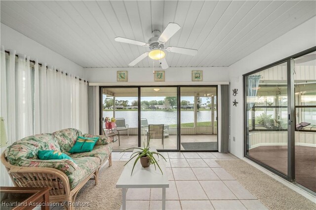 2407 Par Rd, Sebring, FL 33872 - sunroom / solarium with wood ceiling, tile patterned floors, a water view, and ceiling fan