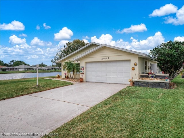 2407 Par Rd, Sebring, FL 33872 - view of front of home with driveway, a water view, an attached garage, a front yard, and stucco siding