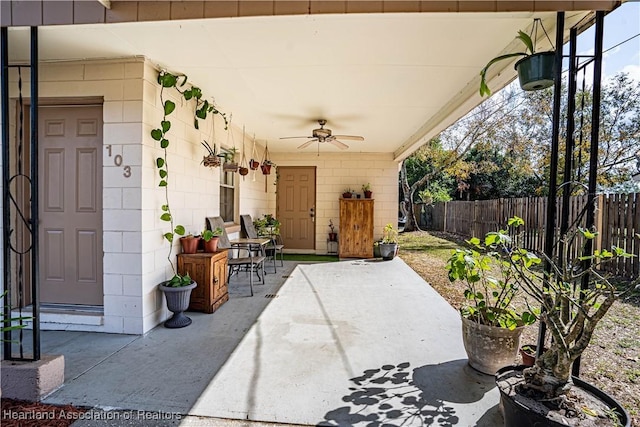 view of patio / terrace featuring ceiling fan