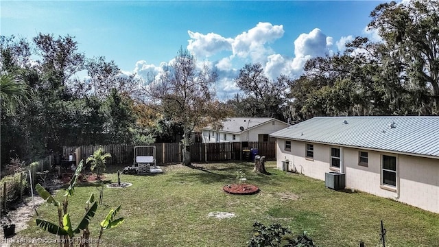 view of yard featuring central AC