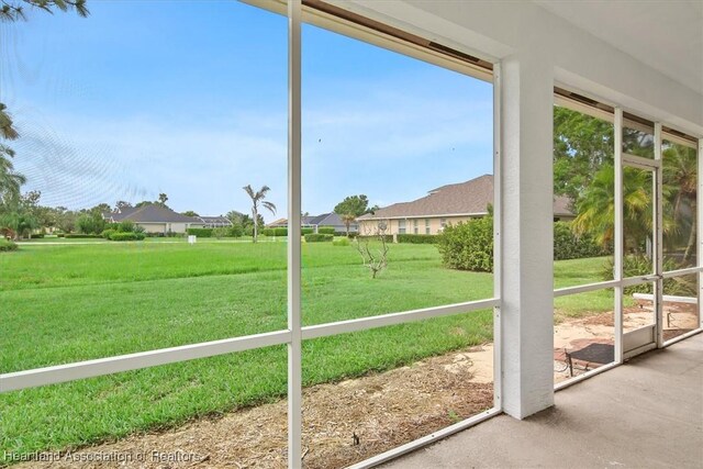 6831 Sun Blvd N, Sebring, FL 33872 - unfurnished sunroom featuring plenty of natural light