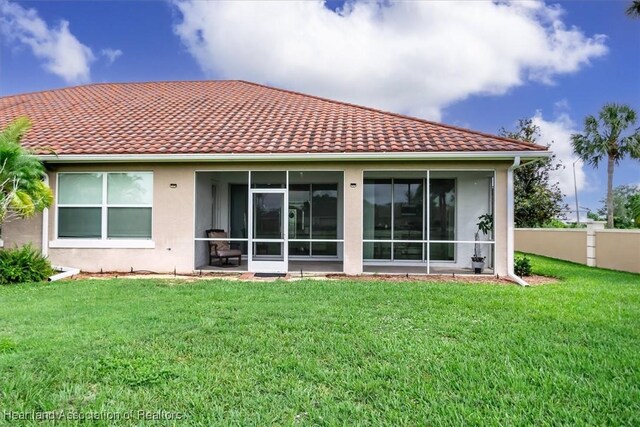 6831 Sun Blvd N, Sebring, FL 33872 - rear view of property featuring stucco siding and a tile roof