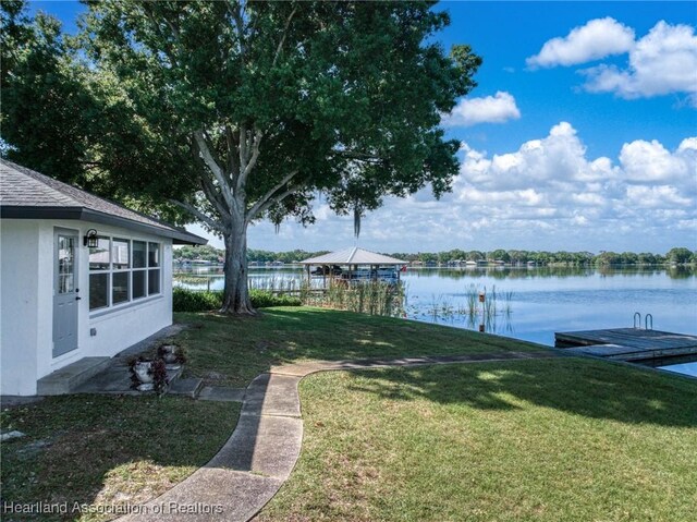 2 Chickasaw St, Lake Placid, FL 33852 - view of yard with a dock and a water view