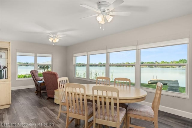 2 Chickasaw St, Lake Placid, FL 33852 - dining space featuring dark wood finished floors, baseboards, and ceiling fan
