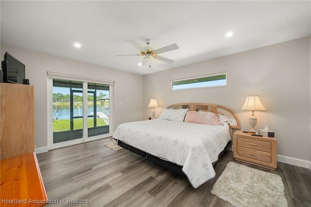 2 Chickasaw St, Lake Placid, FL 33852 - bedroom with access to exterior, recessed lighting, wood finished floors, and baseboards