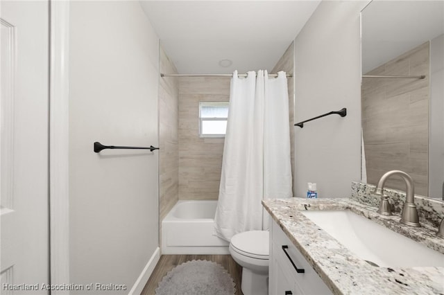 2 Chickasaw St, Lake Placid, FL 33852 - full bath with vanity, toilet, shower / bath combo, and wood finished floors