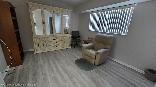 living area featuring light wood-type flooring