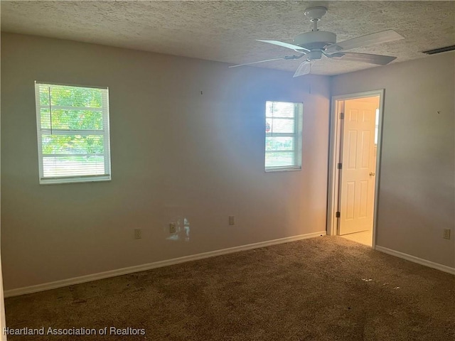 2527 Davis Cir, Sebring, FL 33870 - carpeted spare room featuring ceiling fan, a textured ceiling, and baseboards