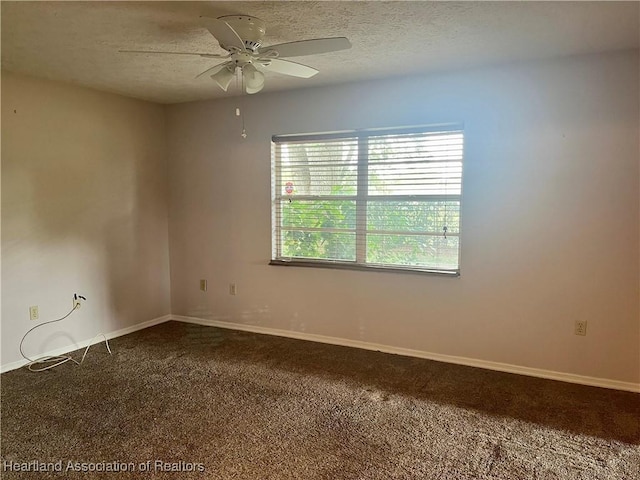 2527 Davis Cir, Sebring, FL 33870 - carpeted spare room with ceiling fan, baseboards, and a textured ceiling