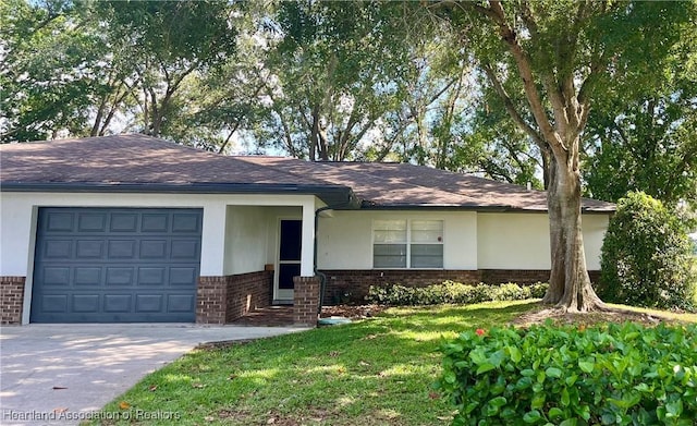 2527 Davis Cir, Sebring, FL 33870 - view of front of home with brick siding, an attached garage, driveway, stucco siding, and roof with shingles