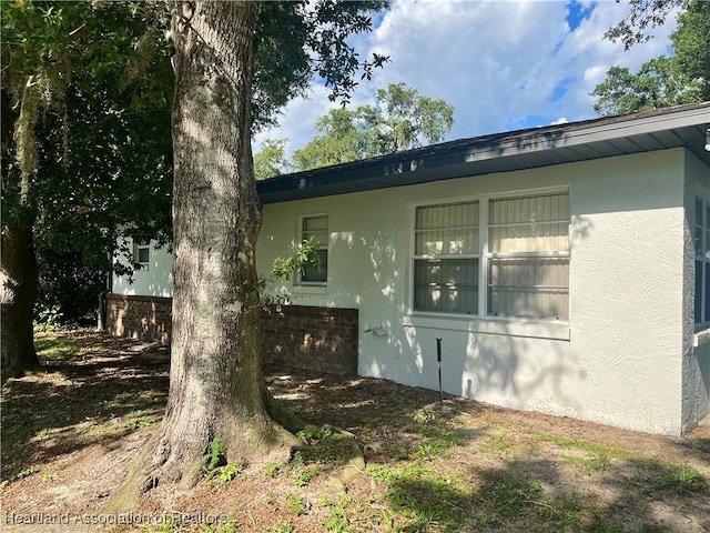 2527 Davis Cir, Sebring, FL 33870 - view of side of home with stucco siding