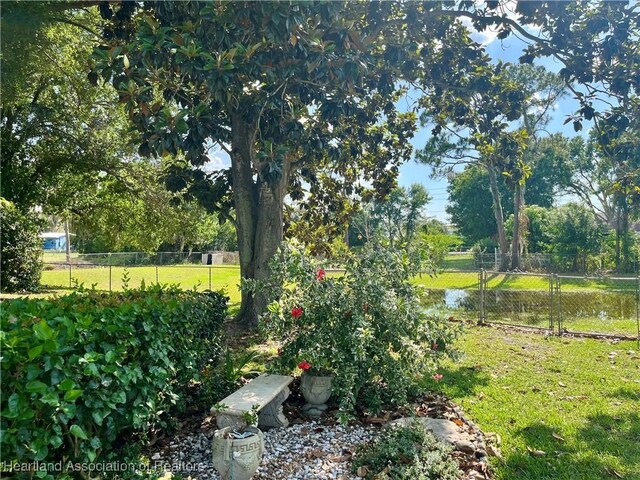 2527 Davis Cir, Sebring, FL 33870 - view of yard featuring view of wooded area