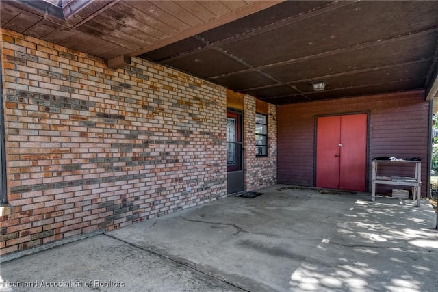 view of patio featuring a carport