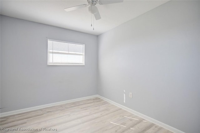 unfurnished room with light hardwood / wood-style flooring and ceiling fan