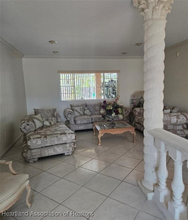 living room featuring tile patterned flooring and crown molding
