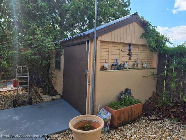 view of outbuilding with an outbuilding