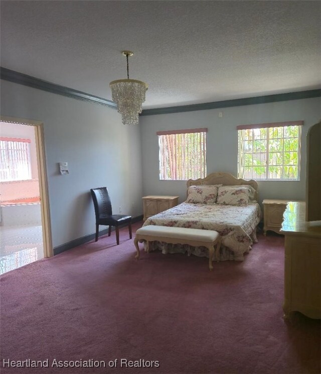 bedroom with dark colored carpet, ornamental molding, and multiple windows
