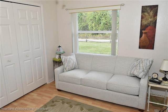 3603 Herring Ave, Sebring, FL 33870 - living room with a wealth of natural light and wood finished floors