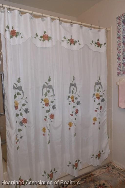 3603 Herring Ave, Sebring, FL 33870 - full bath featuring shower / bathtub combination with curtain