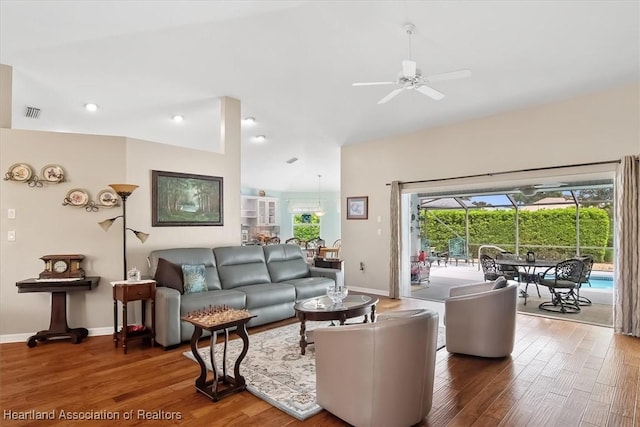 living room with ceiling fan and hardwood / wood-style floors