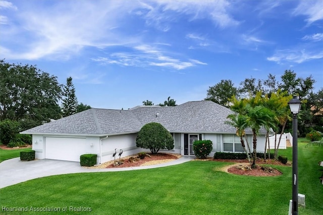 ranch-style home with a front lawn and a garage