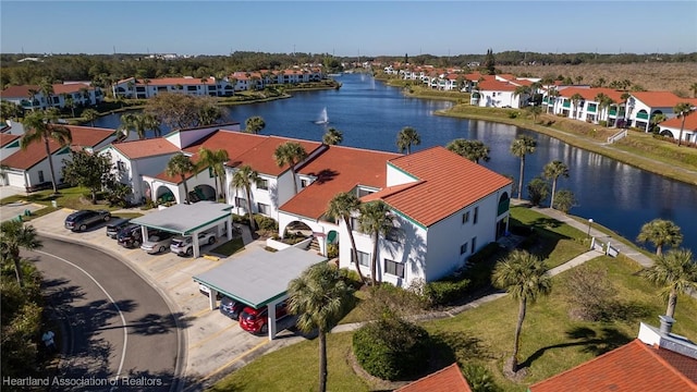 drone / aerial view with a water view