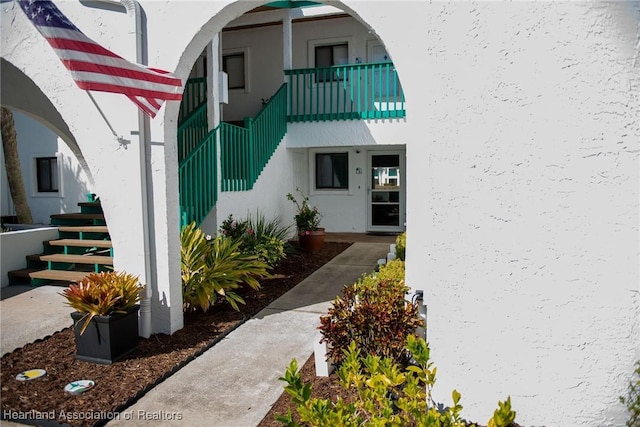 doorway to property featuring a balcony