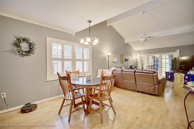 dining room featuring ceiling fan with notable chandelier, french doors, light hardwood / wood-style floors, and lofted ceiling with beams