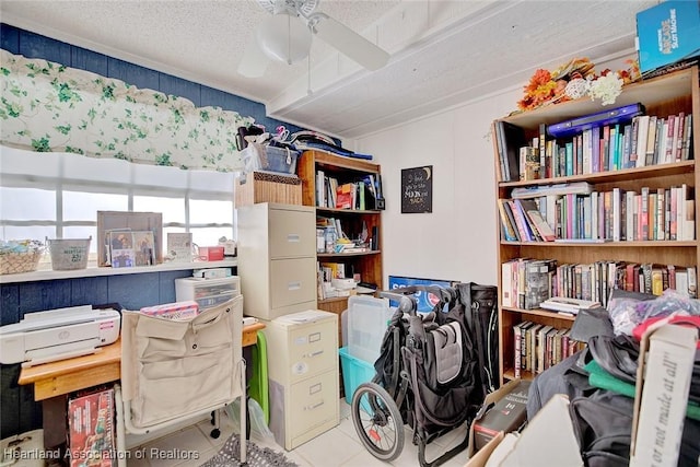 interior space featuring ceiling fan