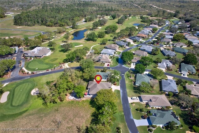 bird's eye view featuring view of golf course, a water view, and a residential view