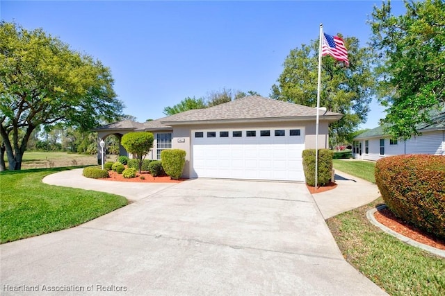 ranch-style house featuring stucco siding, concrete driveway, a front yard, and a garage