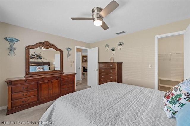 4 Rosewood Dr N, Lake Placid, FL 33852 - bedroom featuring light carpet, a ceiling fan, and a spacious closet