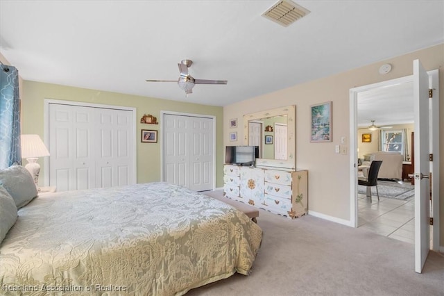 4 Rosewood Dr N, Lake Placid, FL 33852 - bedroom featuring multiple closets, carpet floors, baseboards, and a ceiling fan