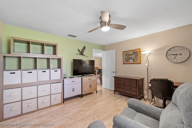 4 Rosewood Dr N, Lake Placid, FL 33852 - living area featuring light wood-style floors, ceiling fan, and an office area