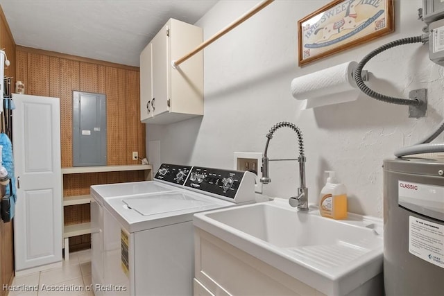 4 Rosewood Dr N, Lake Placid, FL 33852 - laundry room with cabinet space, electric panel, light tile patterned flooring, independent washer and dryer, and water heater