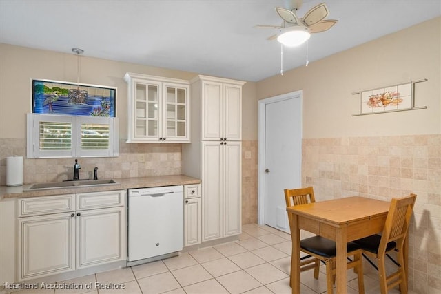4 Rosewood Dr N, Lake Placid, FL 33852 - kitchen featuring dishwasher, a sink, tile walls, ceiling fan, and light countertops