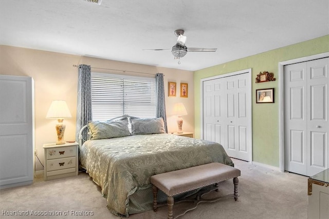 4 Rosewood Dr N, Lake Placid, FL 33852 - bedroom featuring light carpet, two closets, baseboards, and ceiling fan