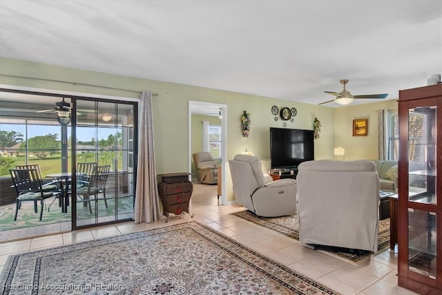 4 Rosewood Dr N, Lake Placid, FL 33852 - living area with ceiling fan, tile patterned flooring, and healthy amount of natural light