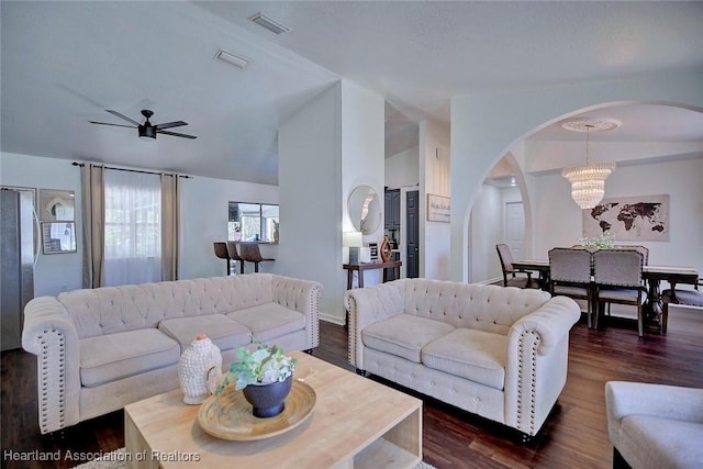 2200 W Geneva Rd, Avon Park, FL 33825 - living room with arched walkways, ceiling fan, dark wood-style flooring, and a chandelier