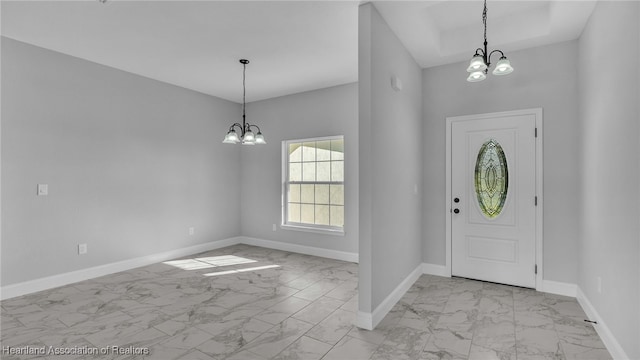 19 N Irvington Rd, Avon Park, FL 33825 - foyer with a notable chandelier