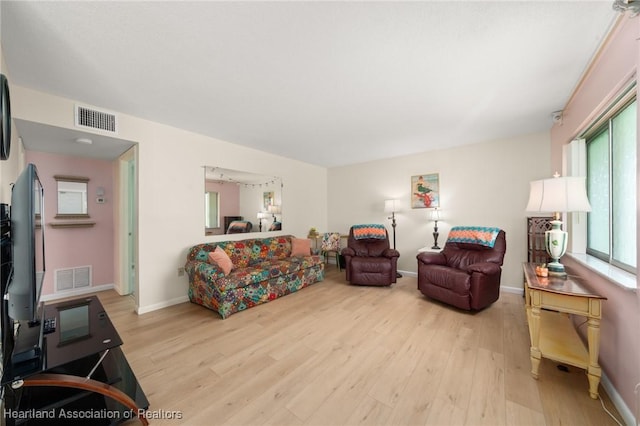 2111 Lakeview Dr Unit 1A, Sebring, FL 33870 - living room with light wood-style flooring and baseboards