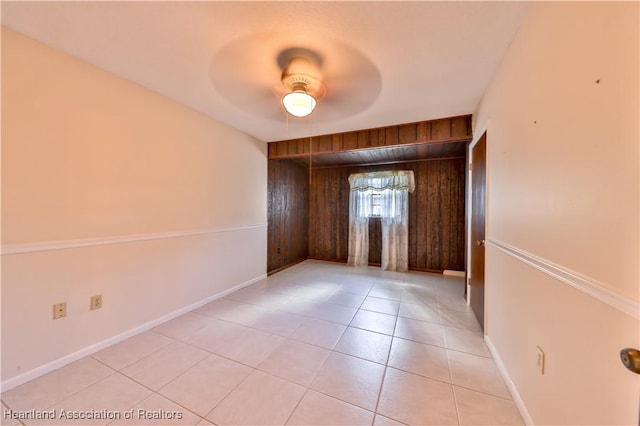 interior space with ceiling fan