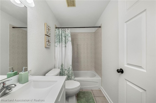 full bathroom featuring tile patterned flooring, shower / bath combination with curtain, toilet, and vanity