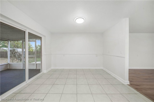 unfurnished room featuring light hardwood / wood-style floors