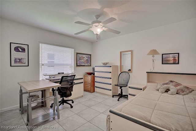 tiled bedroom featuring ceiling fan