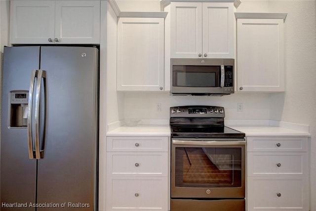 kitchen with white cabinets and stainless steel appliances