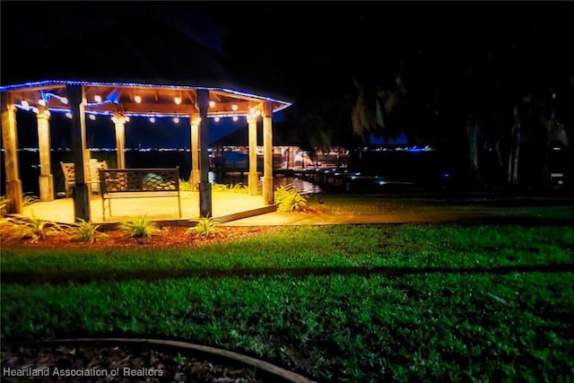 view of yard at night